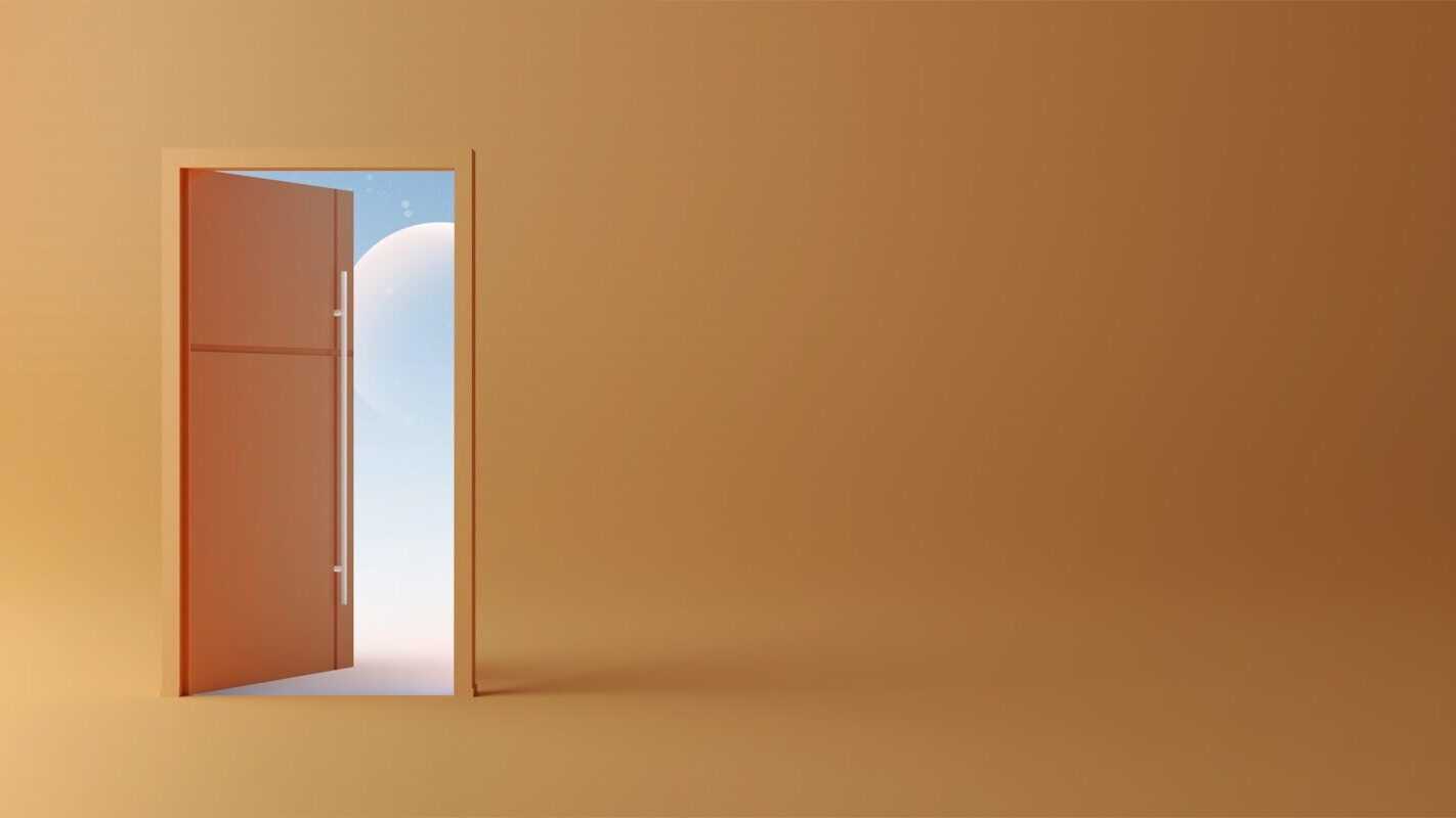 an open door leading to a bright orange room
